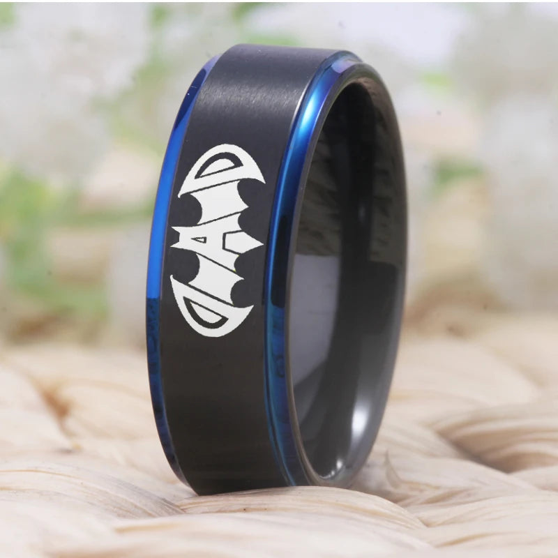 Black ring with blue accent and 'DAD' engraving