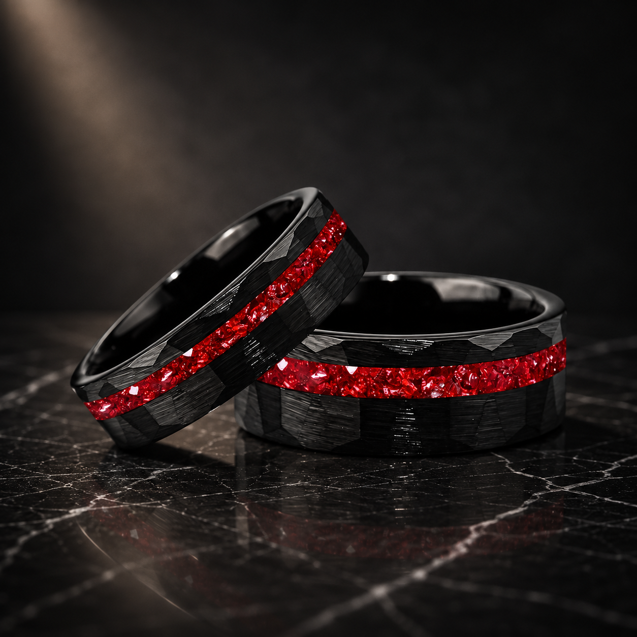 hammered faceted brushed tungsten carbide ring with red crystal stone